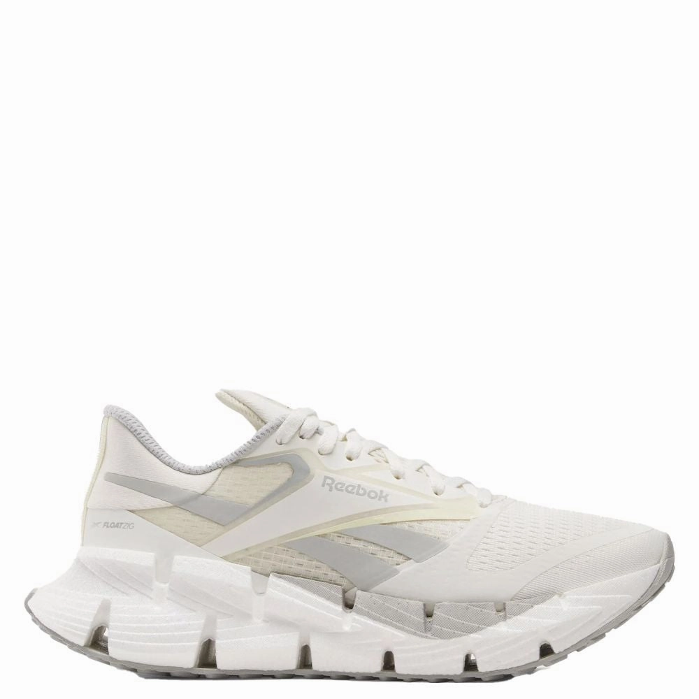 Flexibility Shine Silver Reebok Women's FloatZig 1 in Chalk/Alabaster/Grey1